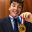 SHS senior Dylan Noone poses for a picture with his State Champion Medal in Poetry Interpretation. 